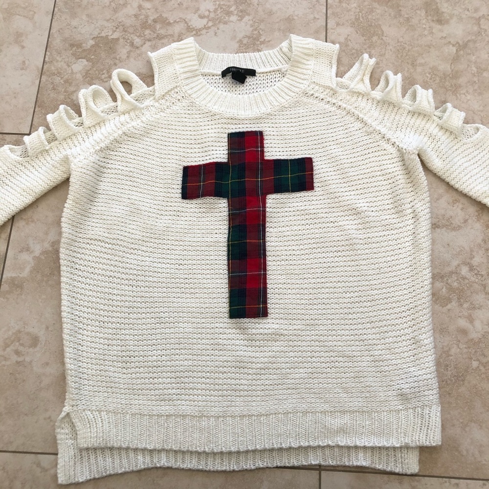 Knit sweater with cutout shoulders